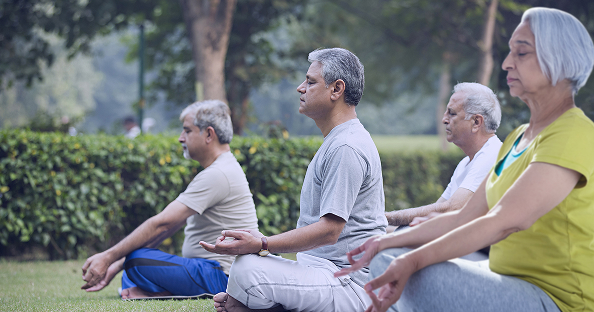 Senior citizen practicing yoga - Columbia Pacific